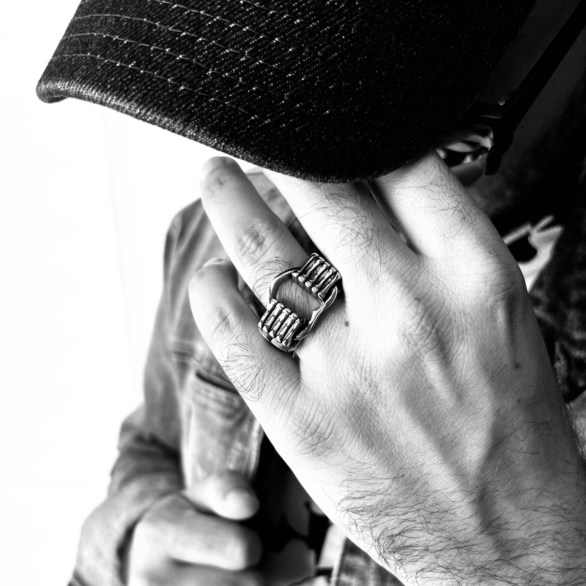 Stainless Steel Polished Heart Gripped By Bone Hands Ring