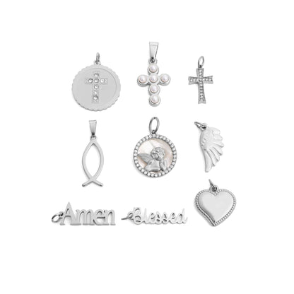 Collection of various silver pendants on a white background