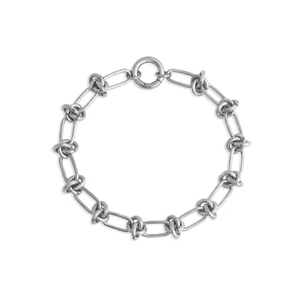 Silver chain bracelet on a white background