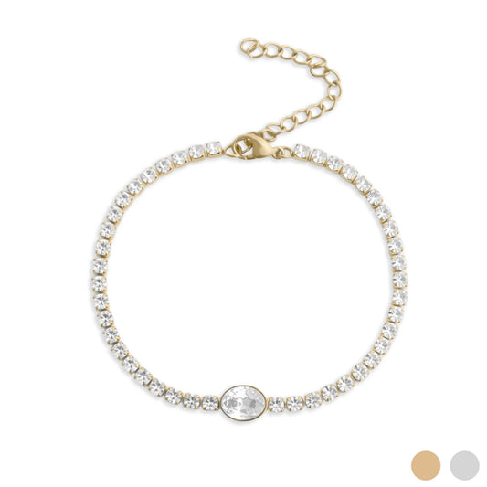 Gold bracelet with clear gemstones on a white background