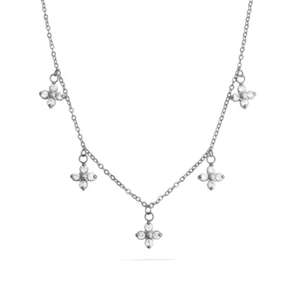 Silver necklace with floral pendants on a white background