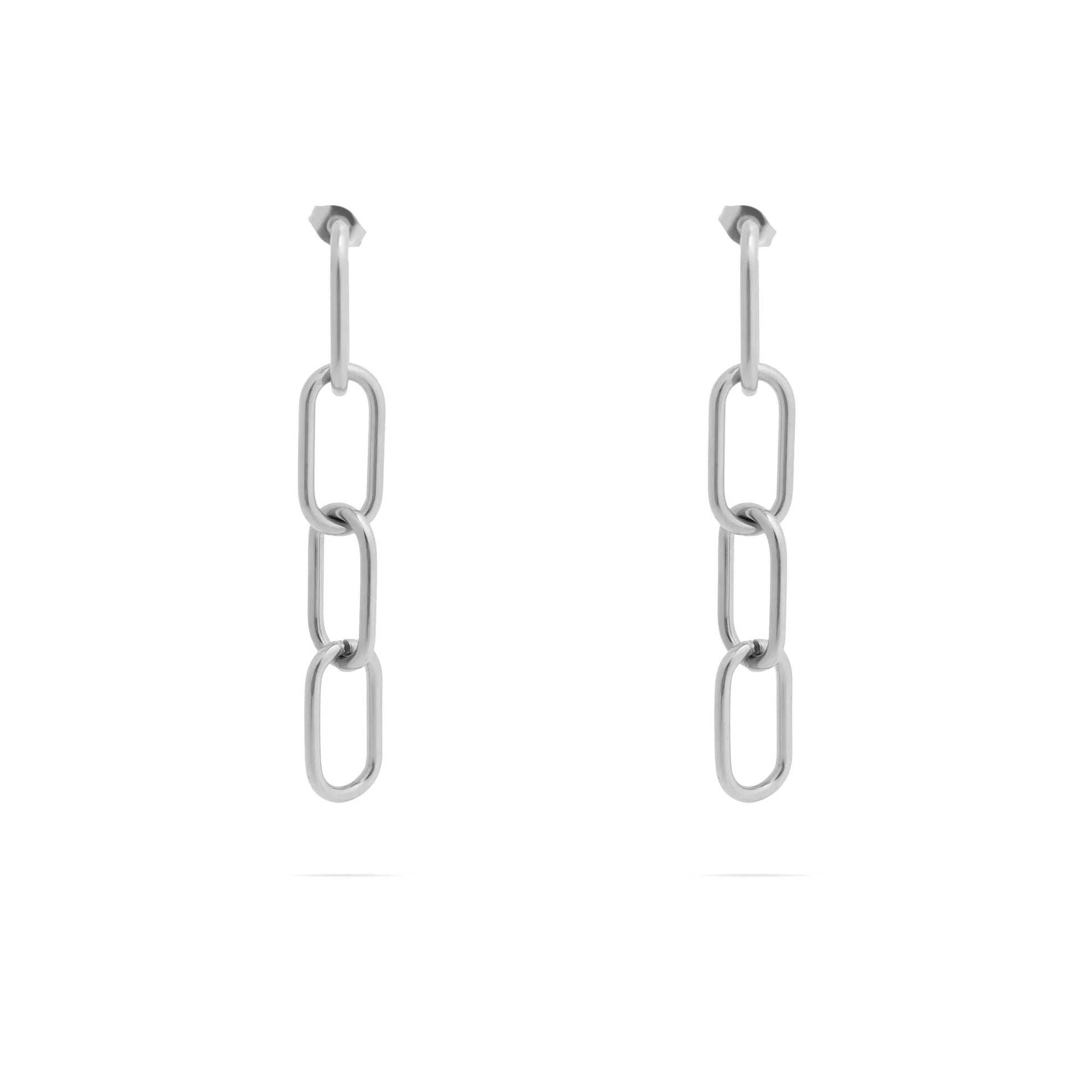 Pair of silver chain link earrings on a white background