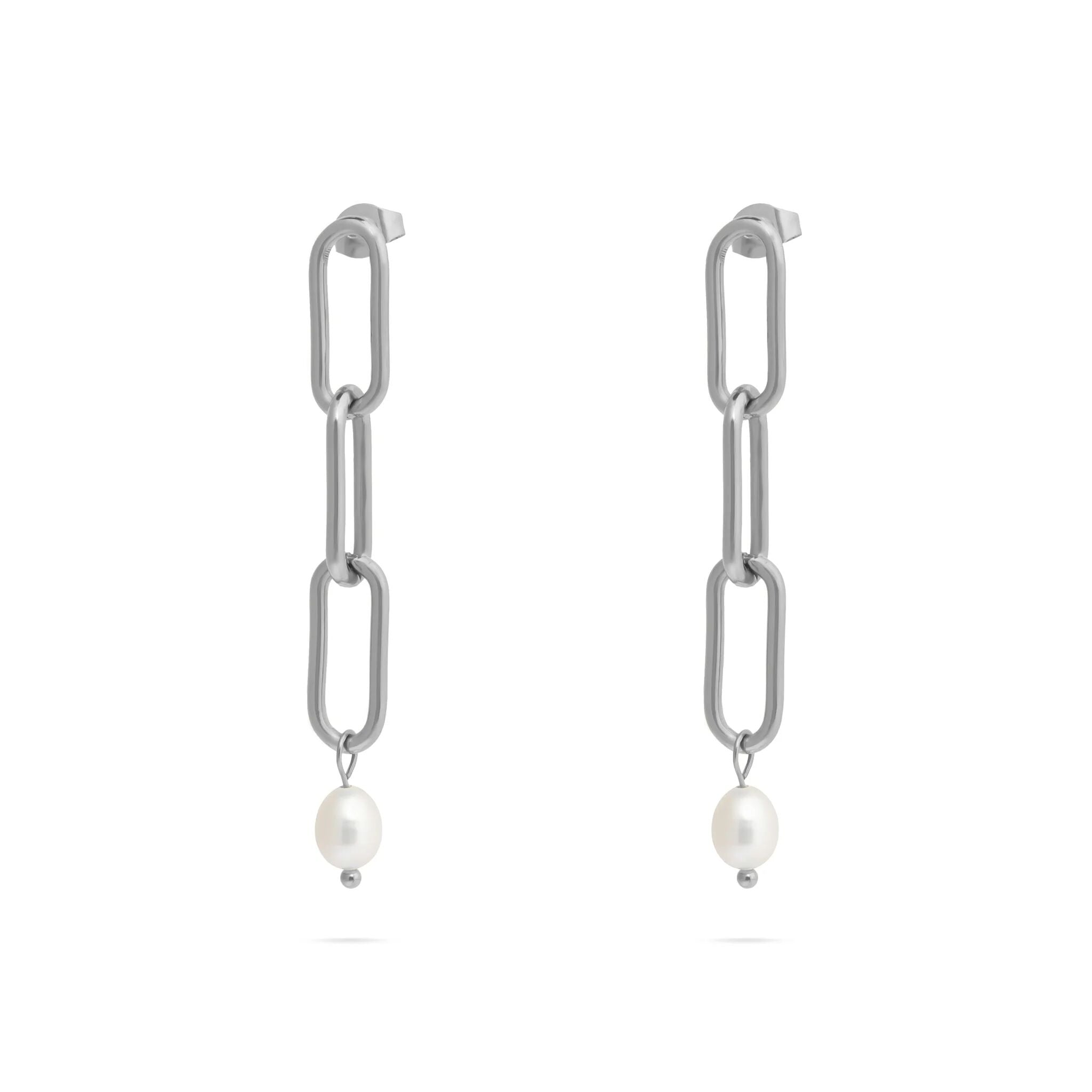 Silver chain earrings with pearl drops on a white background
