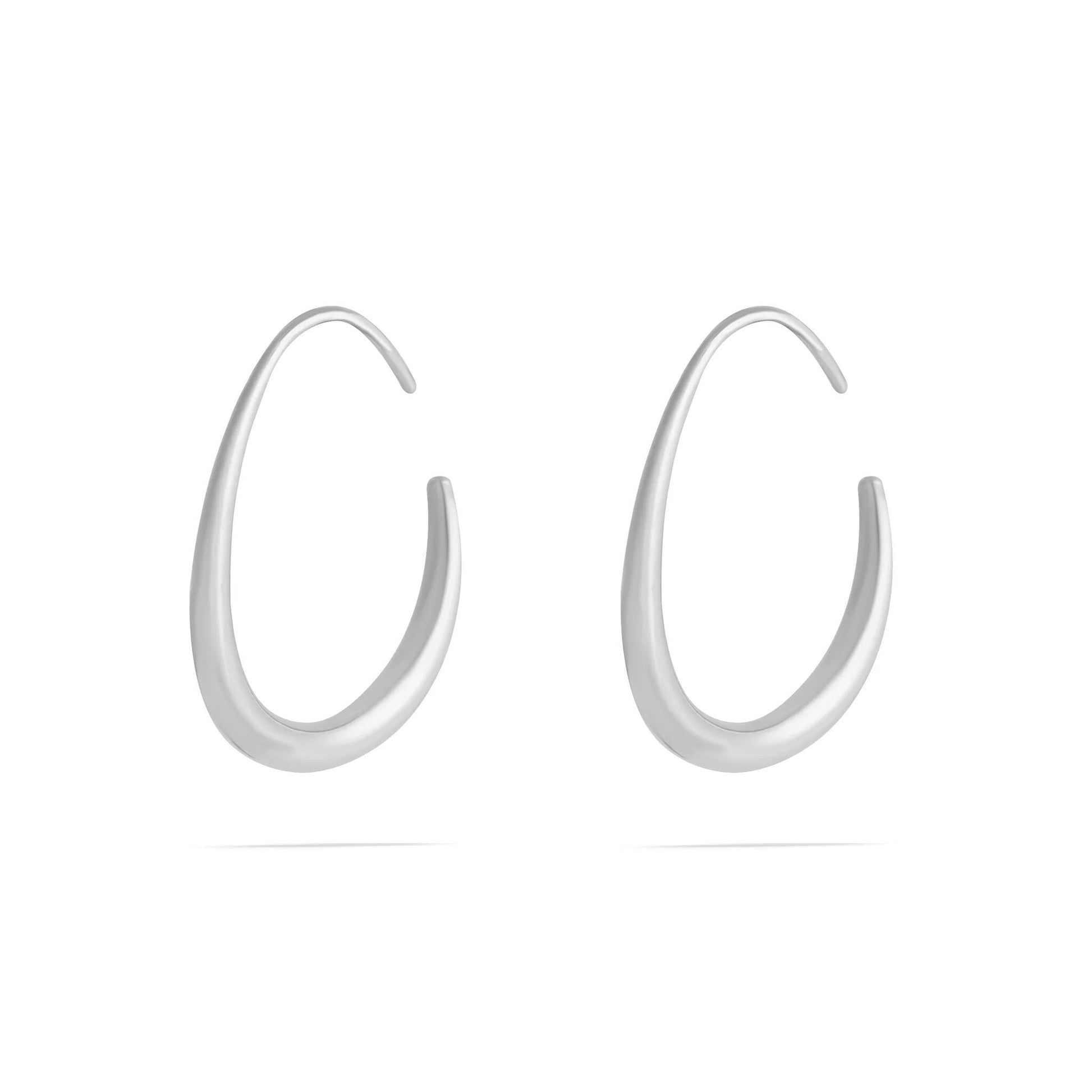 Pair of silver hoop earrings on a white background