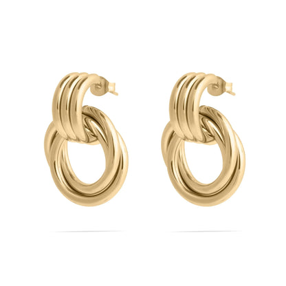 Pair of gold hoop earrings on a white background