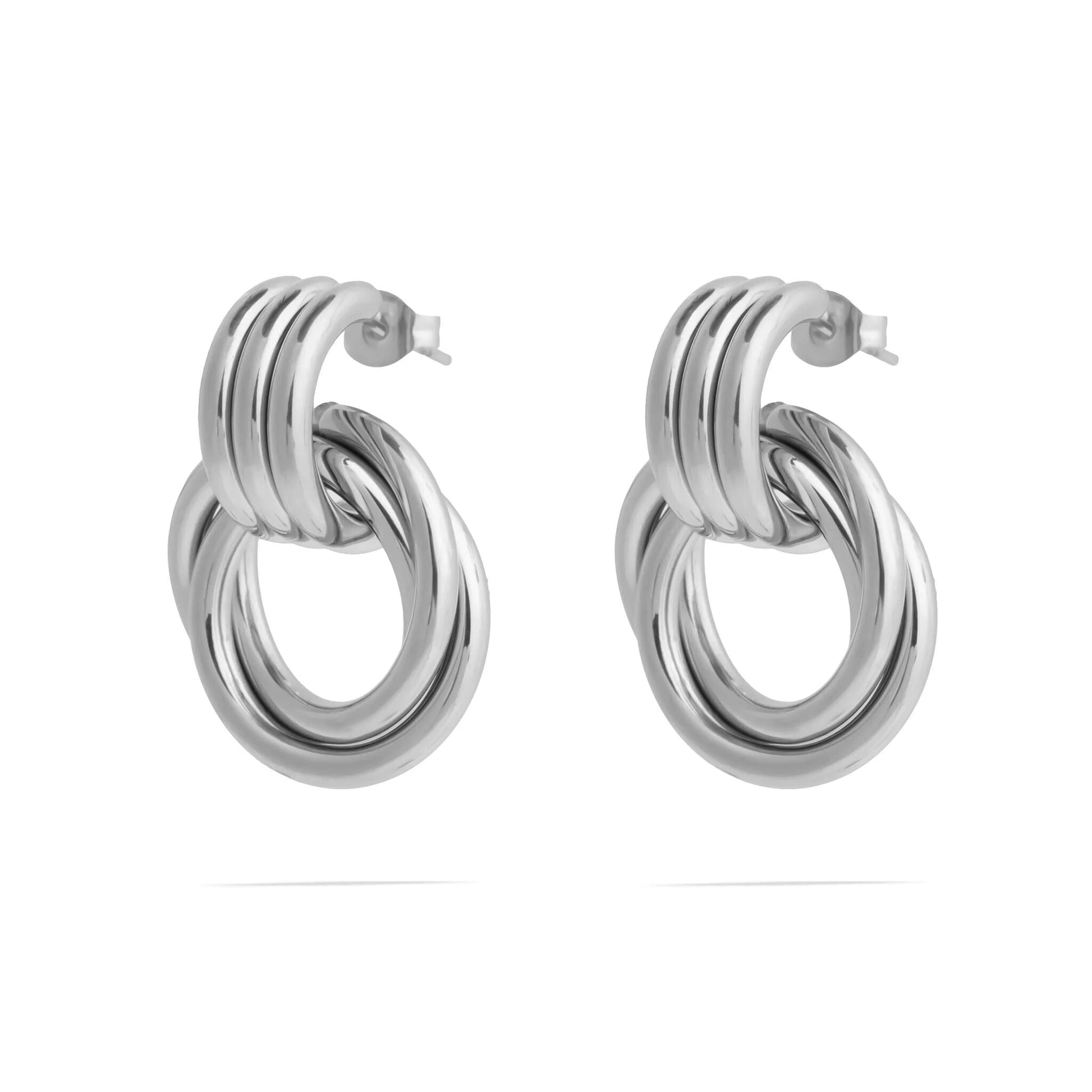 Pair of silver hoop earrings on a white background