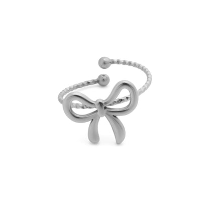 Silver bow-shaped ring on a white background
