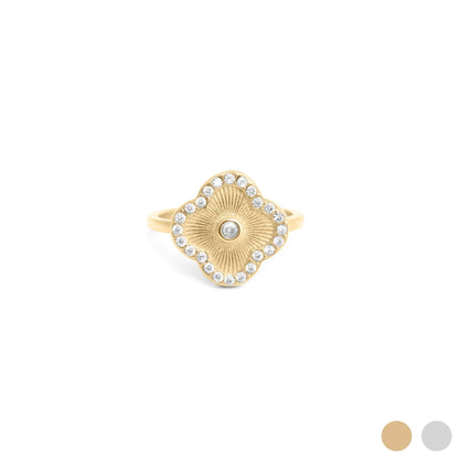 Gold Floral Motif Ring with a CZ stones on a white background