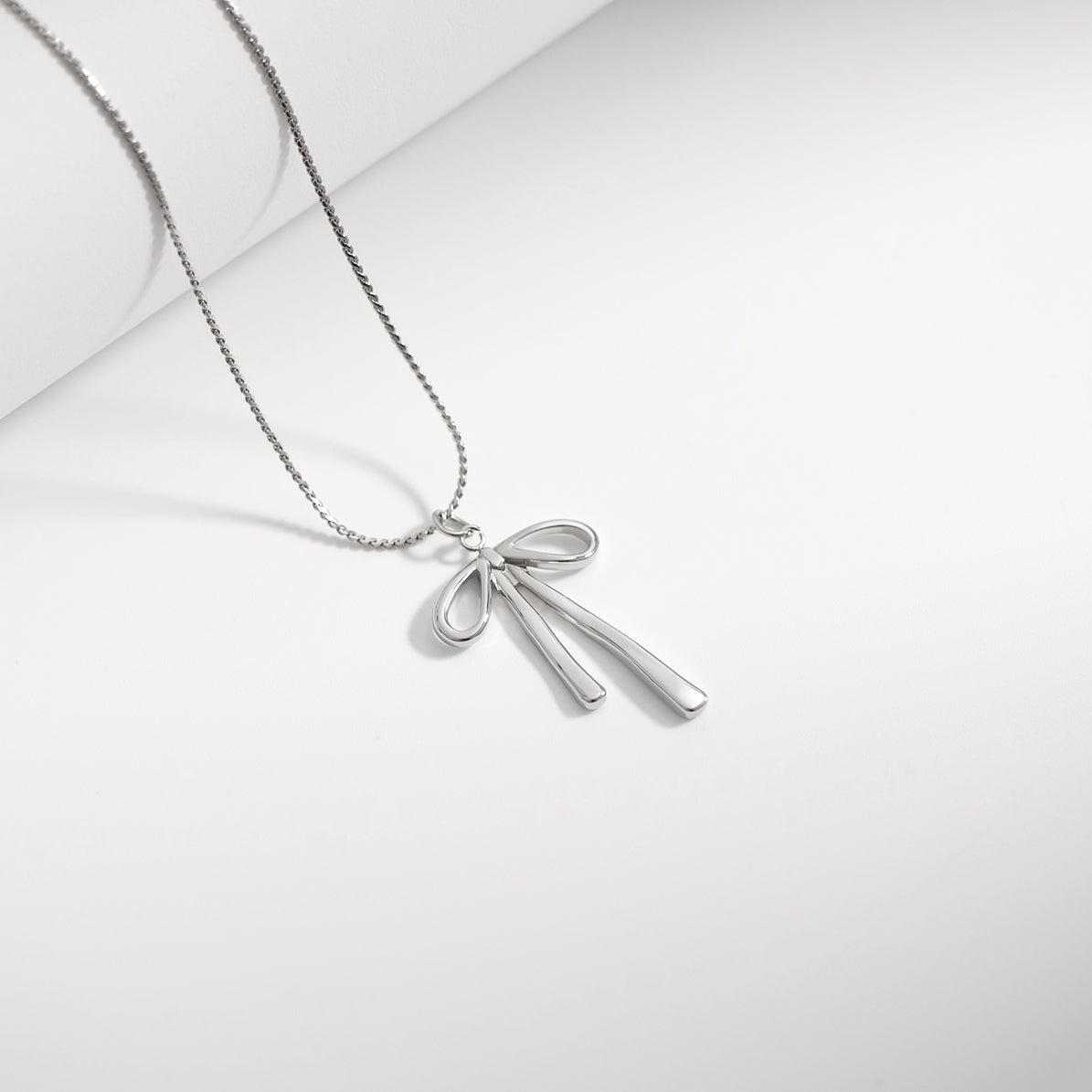 18K Gold PVD Stainless Steel Long Bow Charm