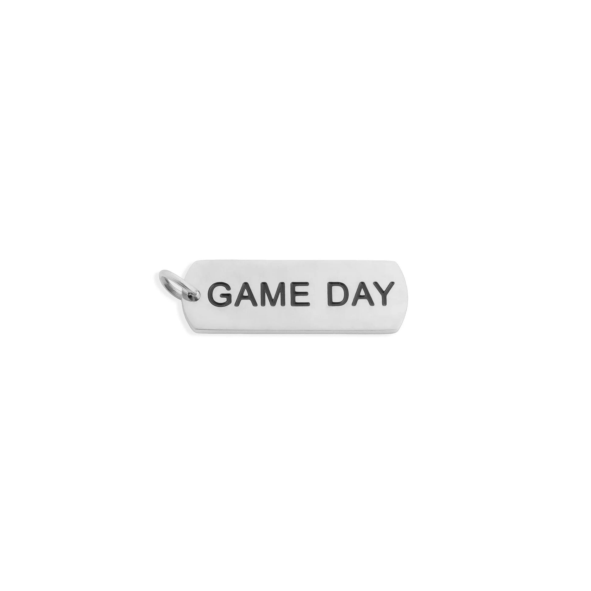 Silver pendant with 'GAME DAY' text on a white background