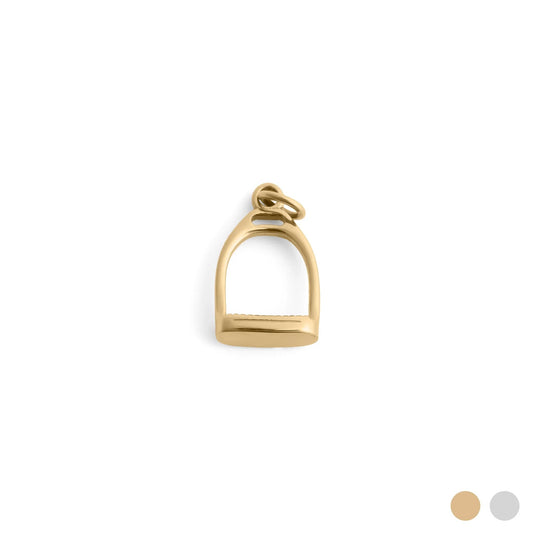 Gold stirrup charm on a white background