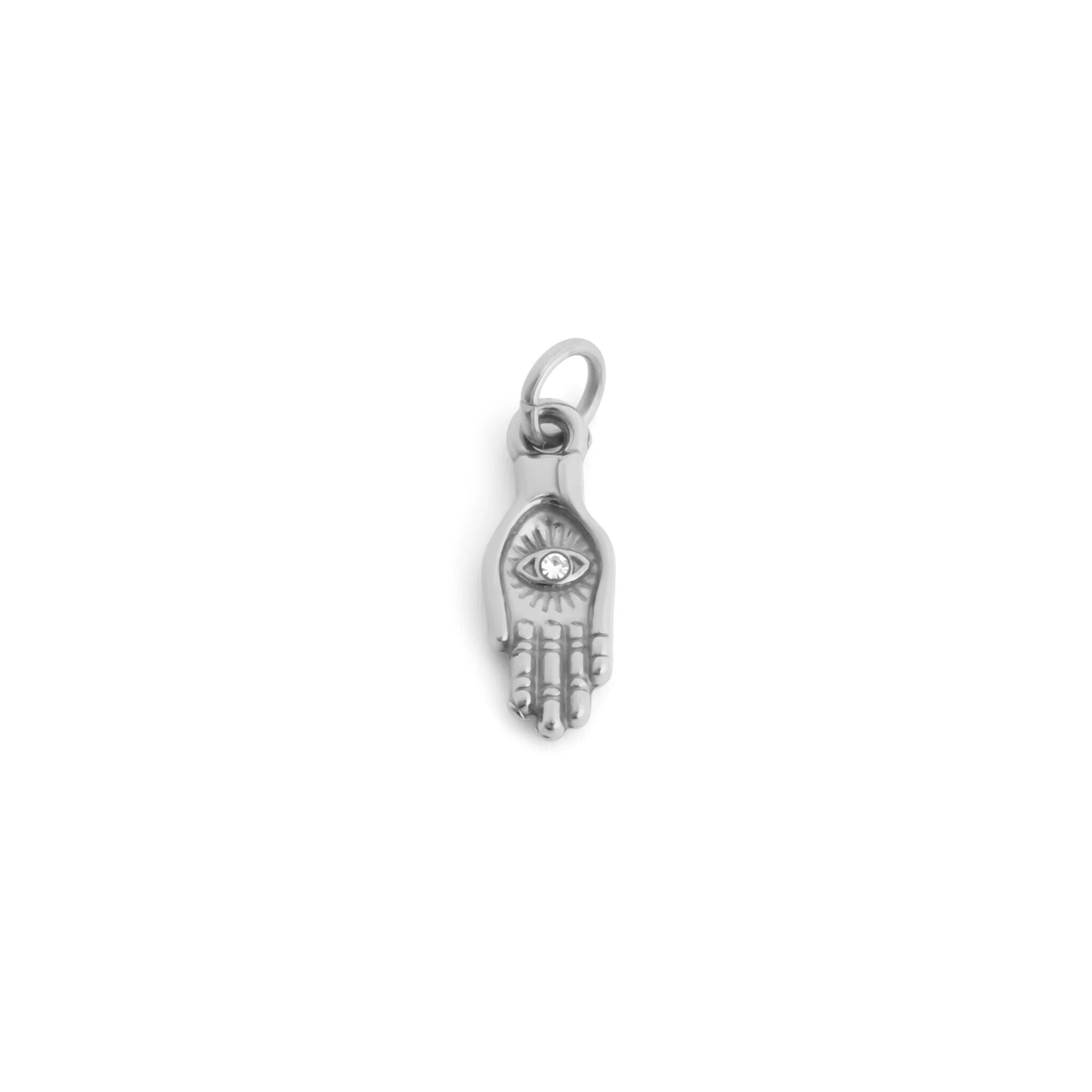 Silver hand charm with eye design on a white background