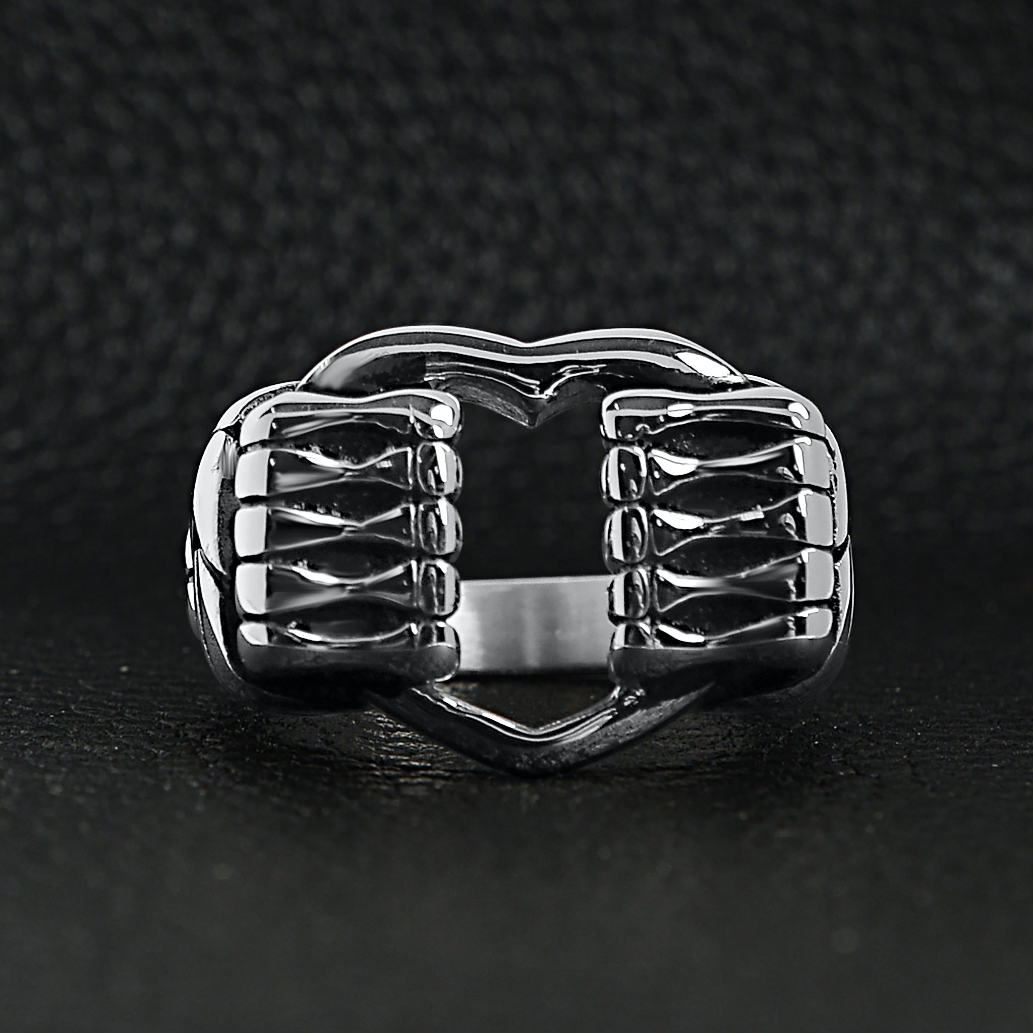 Stainless Steel Polished Heart Gripped By Bone Hands Ring