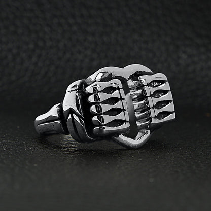 Stainless Steel Polished Heart Gripped By Bone Hands Ring
