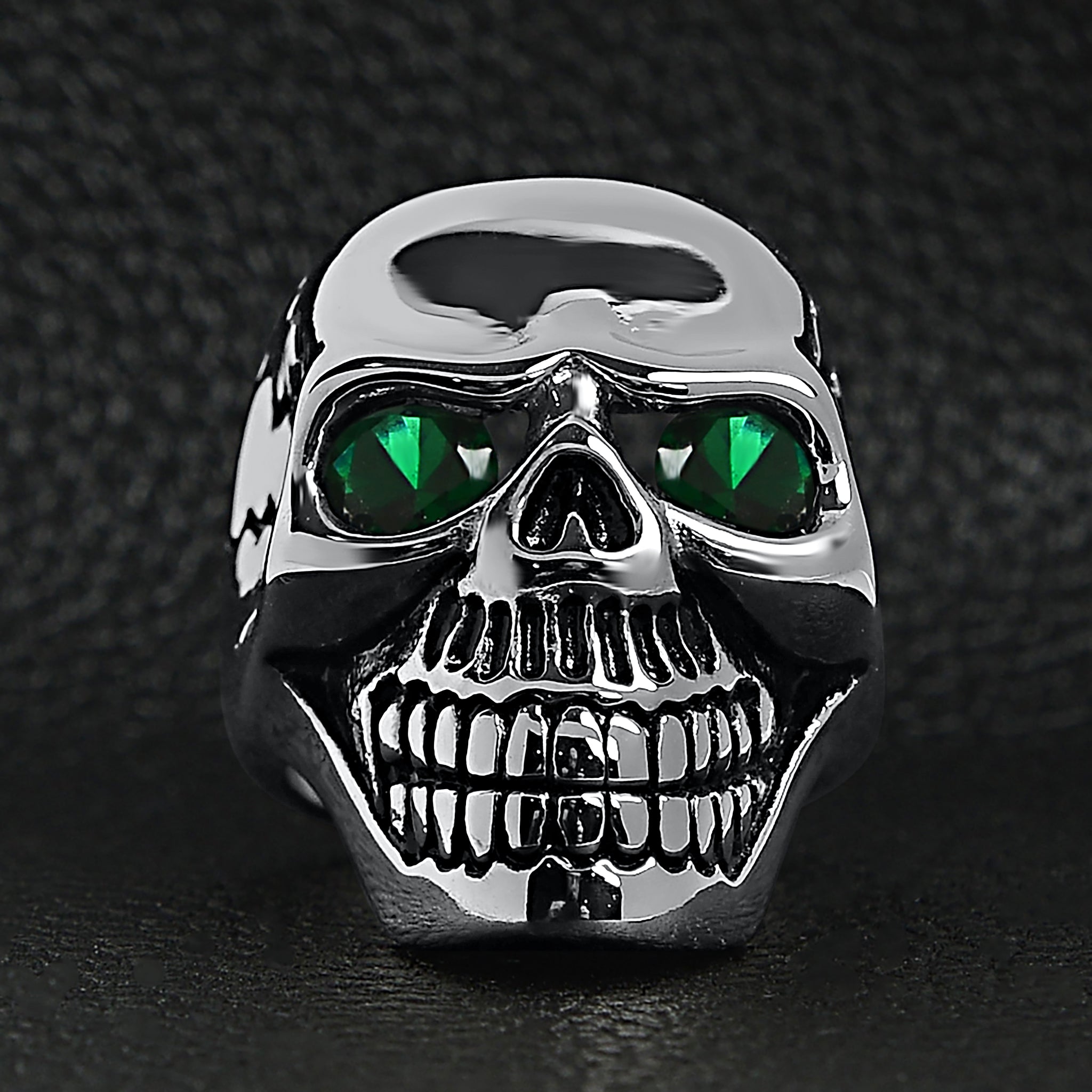 Stainless Steel Green CZ Eyed Cracked Skull Ring