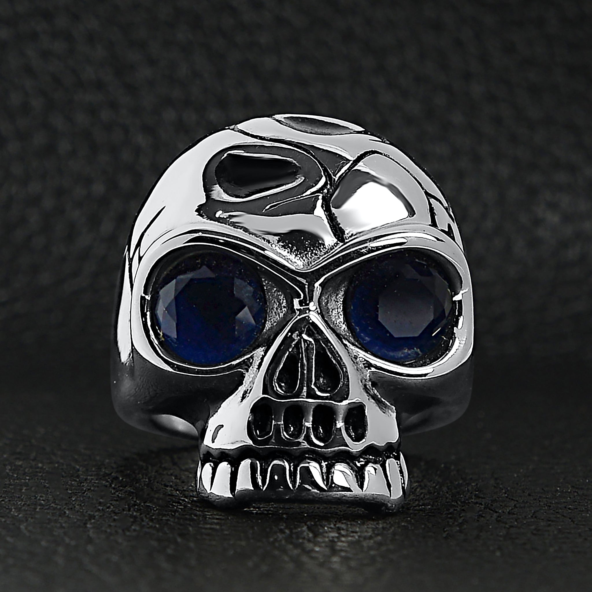 Stainless Steel Blue CZ Eyed Cracked Skull Ring