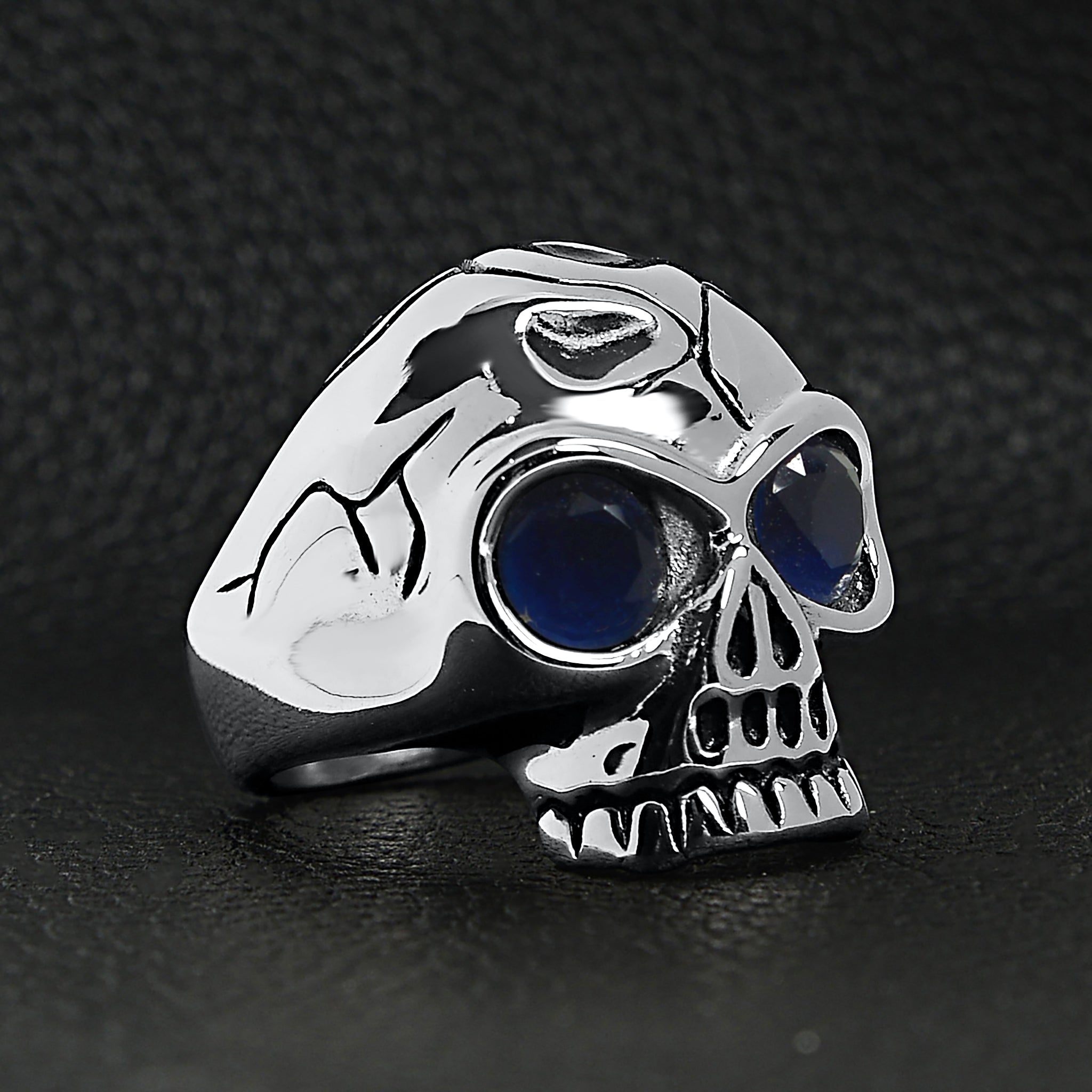Stainless Steel Blue CZ Eyed Cracked Skull Ring