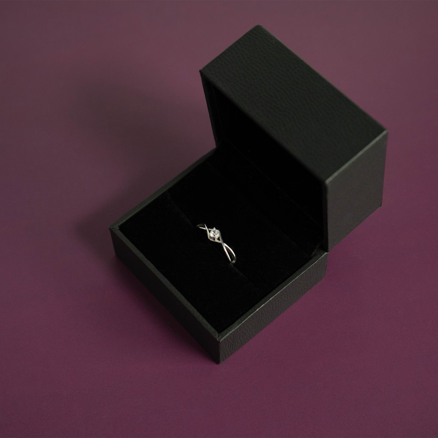 Stainless Steel Twisted Band CZ Accent Ring